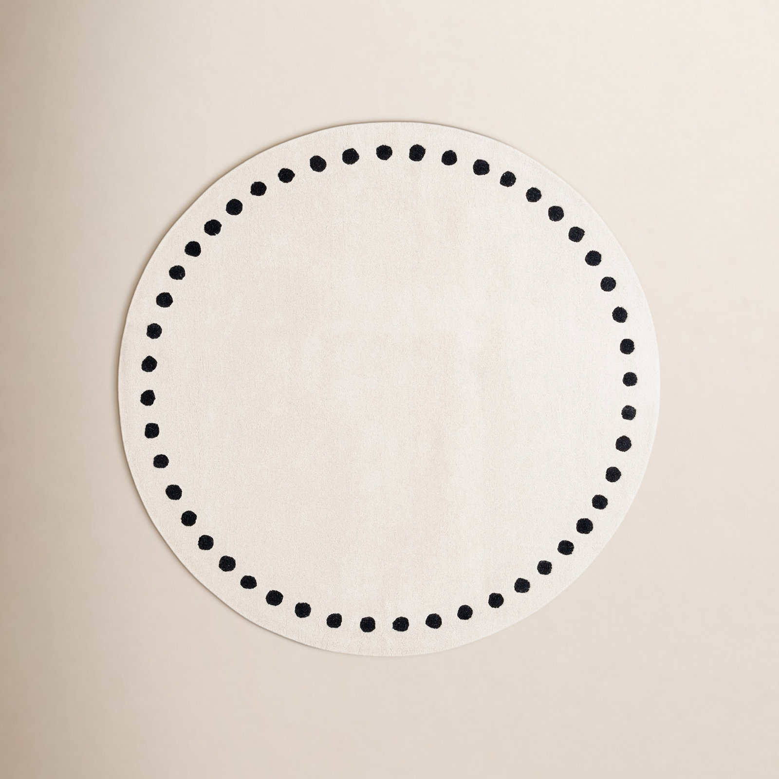 Lexy Polka Dots Handmade Tufted Cotton/Wool Area Rug in Ivory/Black, Round 6'