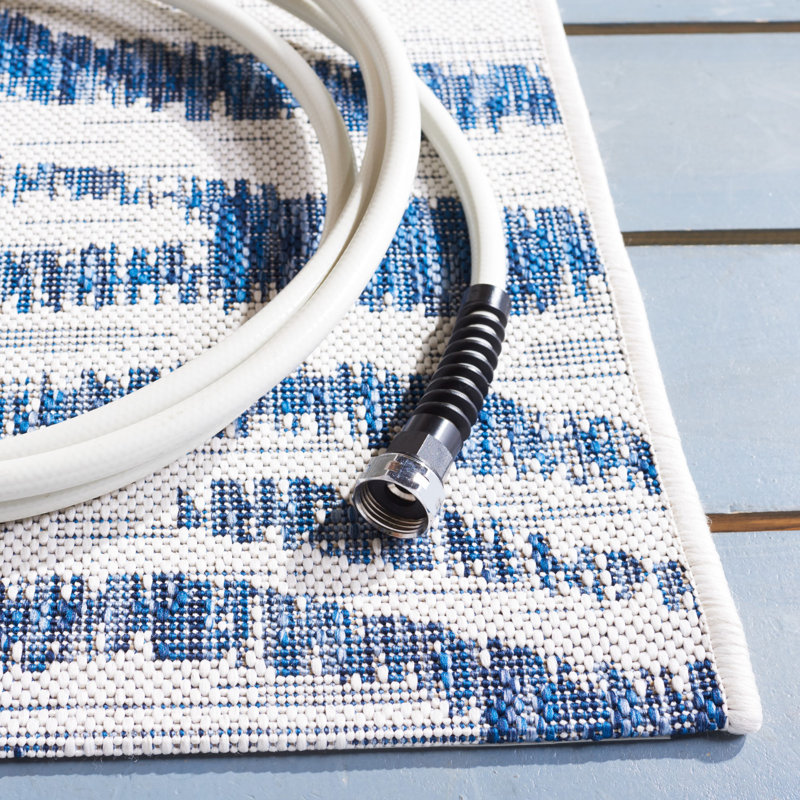 Ivory and Navy Animal Print Indoor/Outdoor Rug