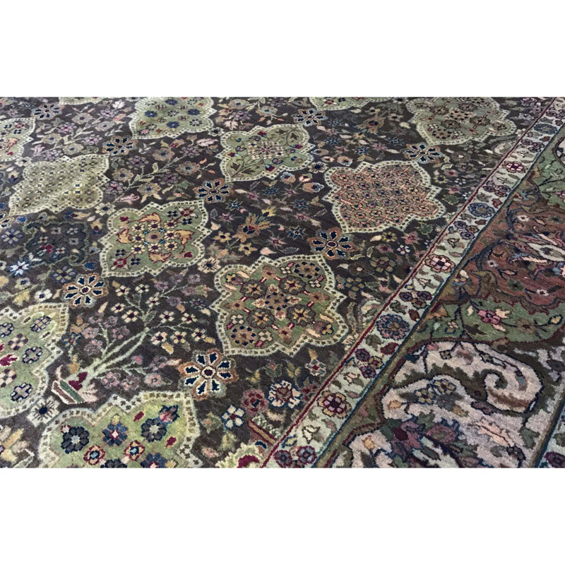 Lamani Wool Oriental Area Rug in Brown/Ivory/Green