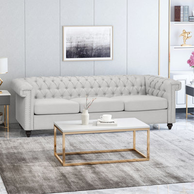 Classic Chesterfield-Style Sofa, A Timeless And Elegant Addition To Your Living Room.