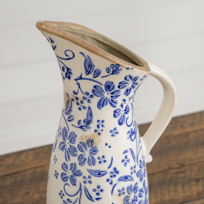 10.5in. Floral Tuscan Ceramic Blue Scroll Pitcher Vase