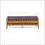 Canapé d'extérieur ASTON 3 SEATER avec accoudoirs encastrés et structure en bois d'acacia durable, parfait pour une détente élégante et confortable.