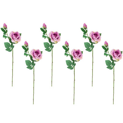 Toucher les tiges artificielles roses