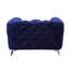  Fauteuil en tissu capitonné bleu