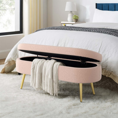 Pouf de rangement ovale en flanelle avec pieds en métal pour un siège d'appoint et un décor chaleureux dans les maisons modernes
