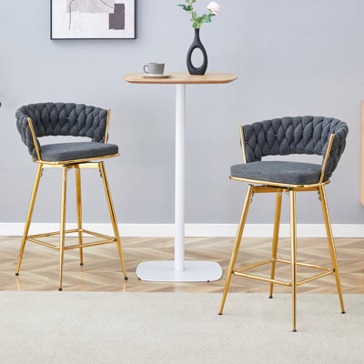 Two Sets Of Swivel Bar Stools