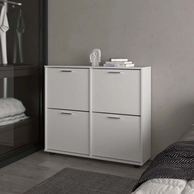 Armoire de rangement blanche à chaussures inclinable avec plusieurs compartiments et design moderne