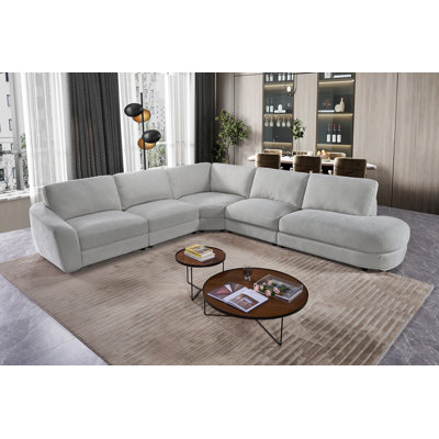 Upholstered Fabric Modular Sectional Sofa With Elegant Curved Design Chaise