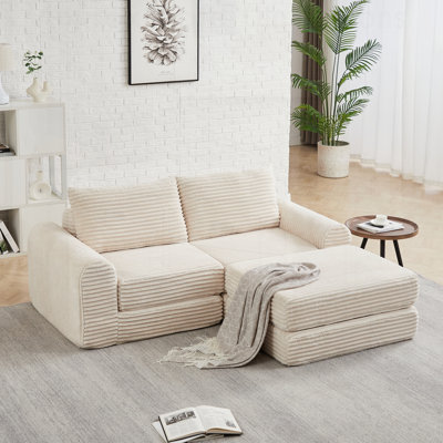 Canapé minimaliste en velours côtelé avec lignes courbes et dossier incliné, canapé 2 en 1 et lit avec deux coussins décoratifs