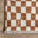 Dominique Abstract Checkered Fringe Area Rug