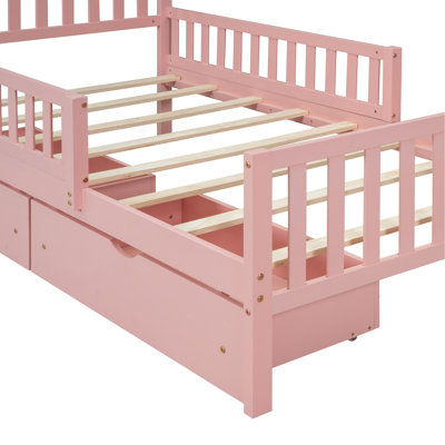 Lit plateforme simple en bois avec garde-corps des deux côtés et deux tiroirs de rangement, rose