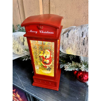 Père Noël dans une lanterne à piles
