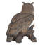Statue eagle hibou on souches