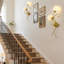 Gold 2-Light Floral Wall Sconce With Frosted Glass Shades