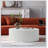 Round Coffee Table with Handcrafted Relief