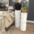 Metal Ribbed White Pedestal Table With Brown Accents Set