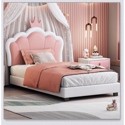 Lit simple tapissier princesse avec tête de lit couronne, blanc et rose, parfait pour les chambres de rêve et un sommeil confortable