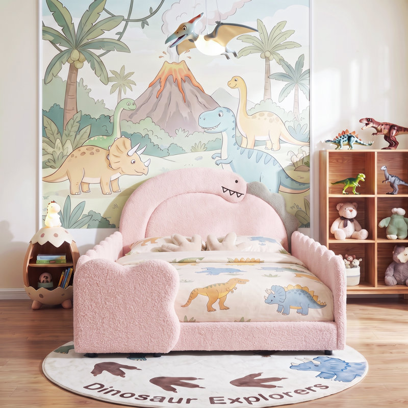 Lit d'enfant en forme de dinosaure, recouvert de tissu bouclé, avec barrières de sécurité et sommier à lattes en bois massif.