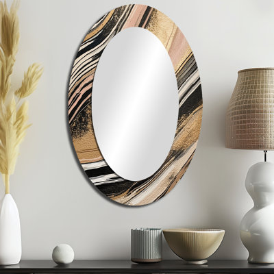 Miroir mural ovale doré