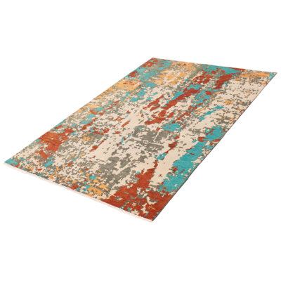 Tapis ivoire unique 5 pi 11 po x 8 pi 9 po Linette