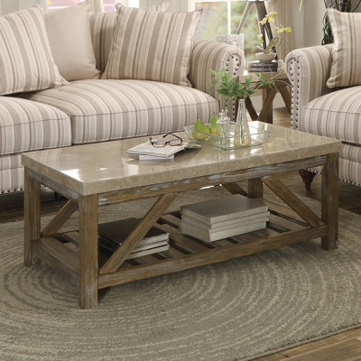 Table basse rectangulaire avec plateau en marbre et base en bois patiné