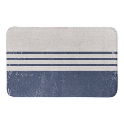 Tapis de bain à rayures vieillies