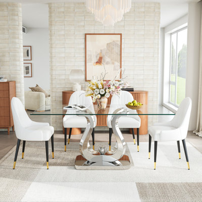 69" Rectangular Glass Dining Table Set, Tempered Glass Top, Polished Stainless Steel S-Shaped Base, Faux Leather Diamond-Back Chairs With Gold Metal Accents