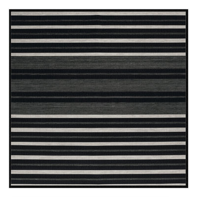 Tapis noir à rayures horizontales lavable à la machine