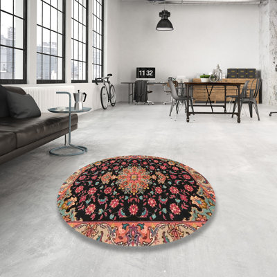 Tapis oriental noir / rouge