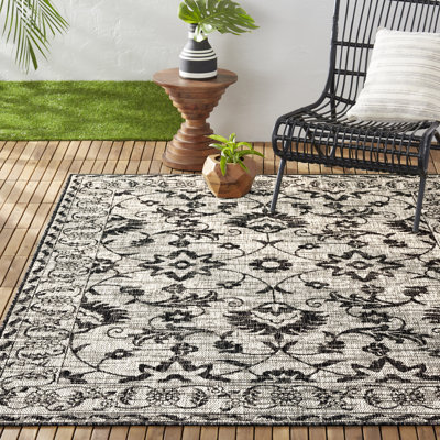 Tapis intérieur / extérieur floral Nicole Miller