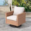 Chaise d'extérieur pivotante en rotin avec coussins