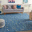 Tapis bleu clair Aratrika-912291192