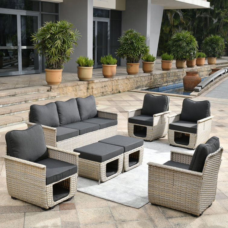 Lovall Rattan Wicker 7 - Person Seating Group with Fire Pit and Cushions Ebern Designs Cushion Color: Black