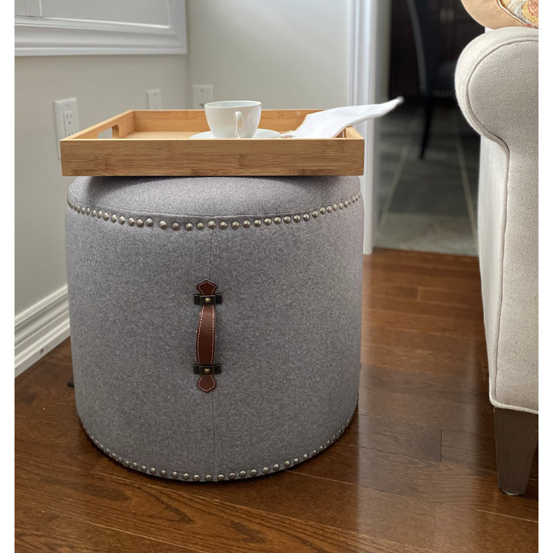 Johnny Fabric Upholstered Round Pouf Ottoman with Faux Leather Handle, Light Gray Polyester