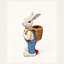 Statue de lapin de jardin en salopette bleue