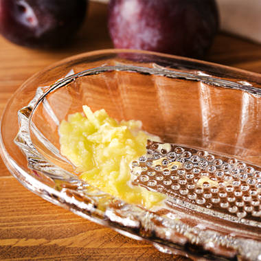 3-in-1 Tabletop Grater: effortlessly grate, shred or slice.