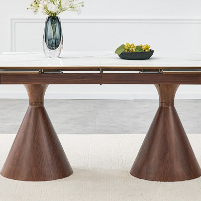 Extendable Stone-Top Dining Table: White marble-patterned tabletop with tapered metal legs. A modern, luxury-inspired rectangular dining table for hom