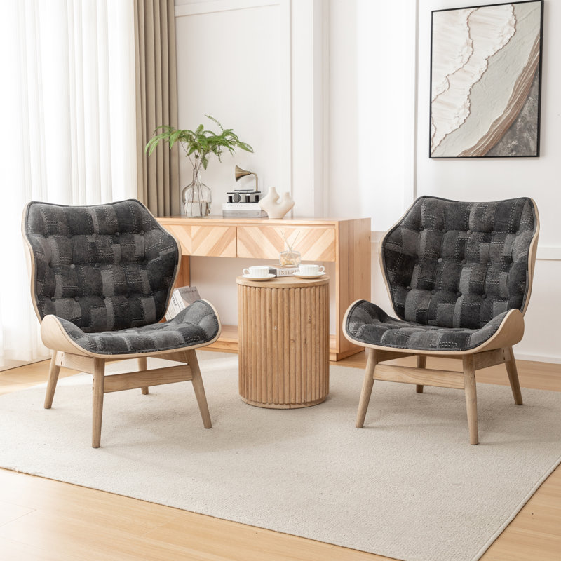 Fauteuil à oreilles capitonné Jeyshan, Polyester noir / gris