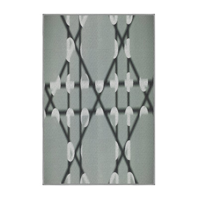 Tapis gris tissé à la machine