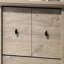 Commode 4 tiroirs avec poignées noires Elara-1732163438