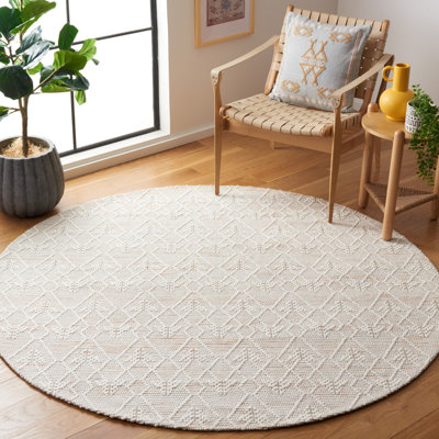 Manya Geometric Handwoven Wool/Polyester Area Rug in White/Beige