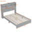 Grand lit gris avec rangement spacieux et options de chargement pour tête de lit-518111846