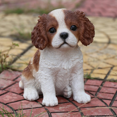Statue chiot king charles assis