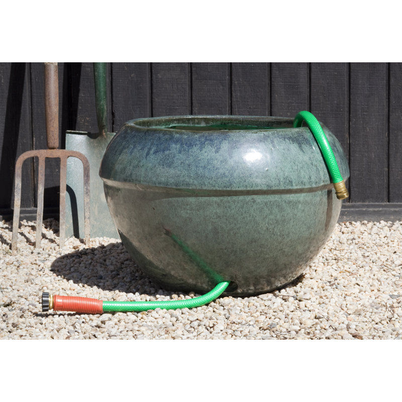 Pot à boyau d'arrosage