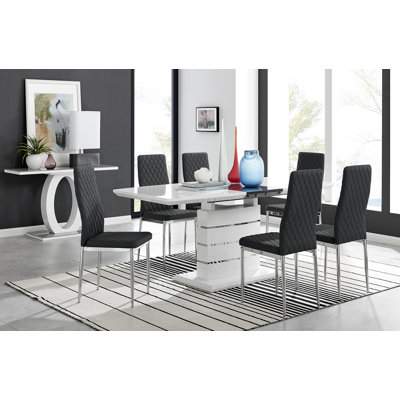 Grand ensemble de salle à manger extensible Everson avec 8 chaises rembourrées en similicuir