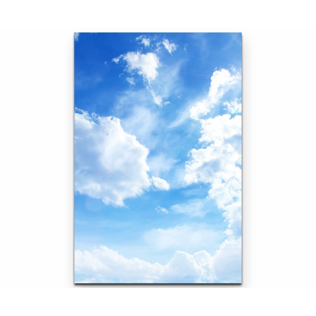 Leinwandbild Strahlender Himmel mit Wolken