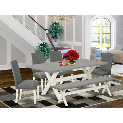 L'ensemble de table de cuisine 6 pièces comprend une table de salle à manger rectangulaire avec pieds en X et 4 chaises Parson en tissu gris avec banc, lin blanc