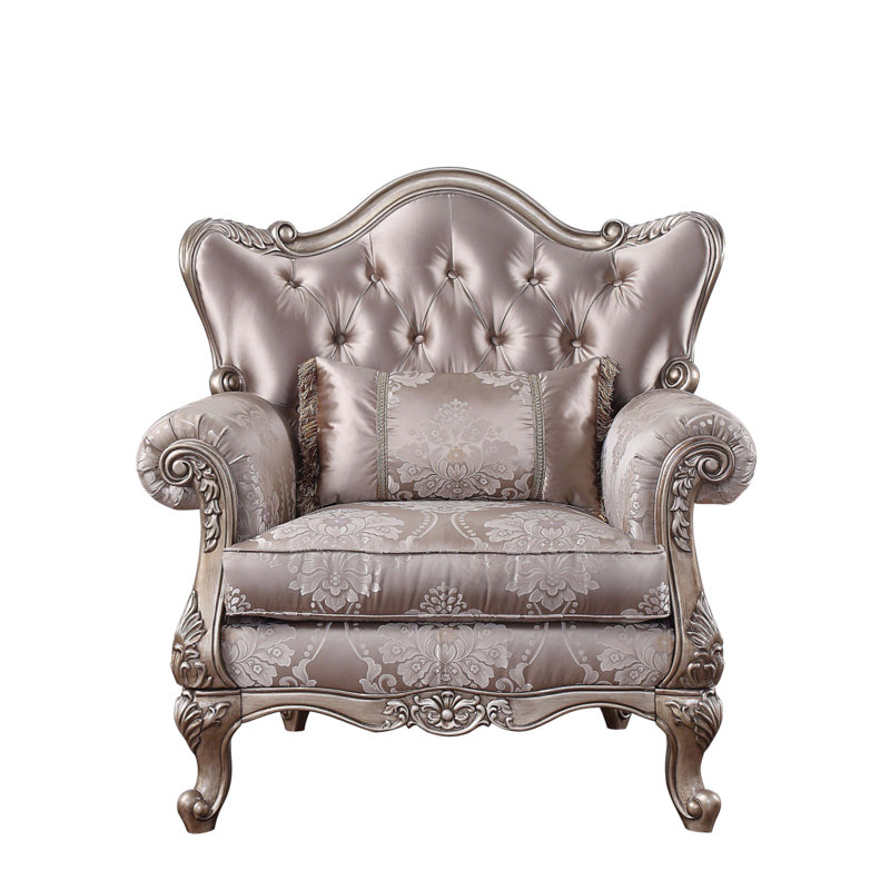 Chaise en tissu et champagne avec coussin