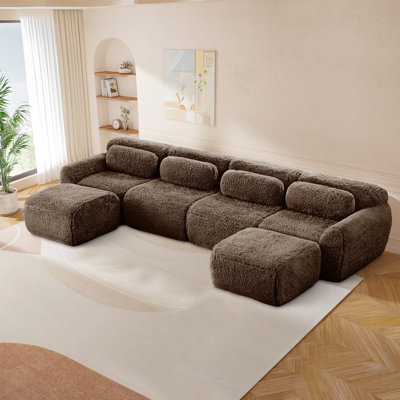 Ensemble de canapé modulaire à quatre places en tissu moelleux moelleux avec repose-pieds, rembourré de mousse haute densité 32D, comprend des coussins décoratifs et convient aux espaces de salon.