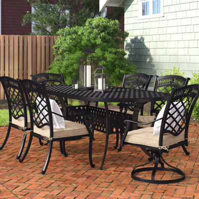 Ellston 6 - Person Patio Dining Set Umbrella Hole Included Oval Table with Cushions Included